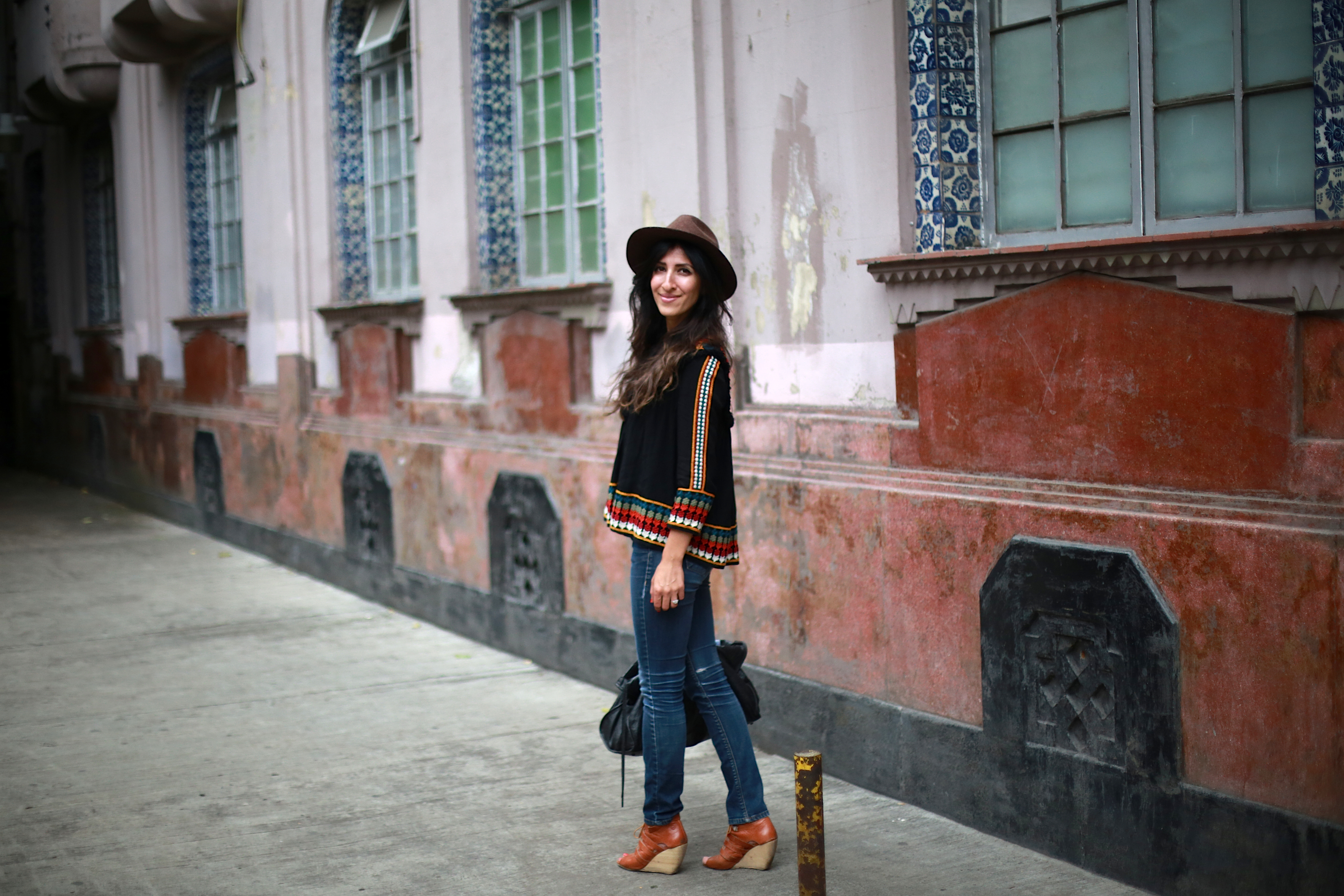 Draw attention to small details like subtle embroidery by accentuating with accessories - floppy hats and statement bags will pull the entire look together!