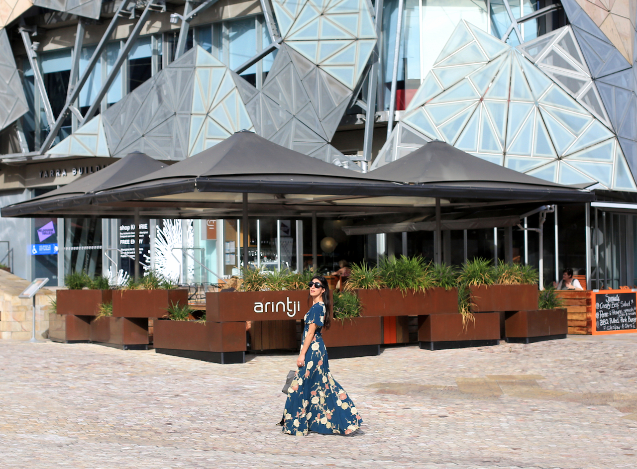 Bigger, bolder prints give you more freedom to play with accessories like big bags with gold hardware or chunky lace-up shoes | Federation Square - Melbourne, Australia