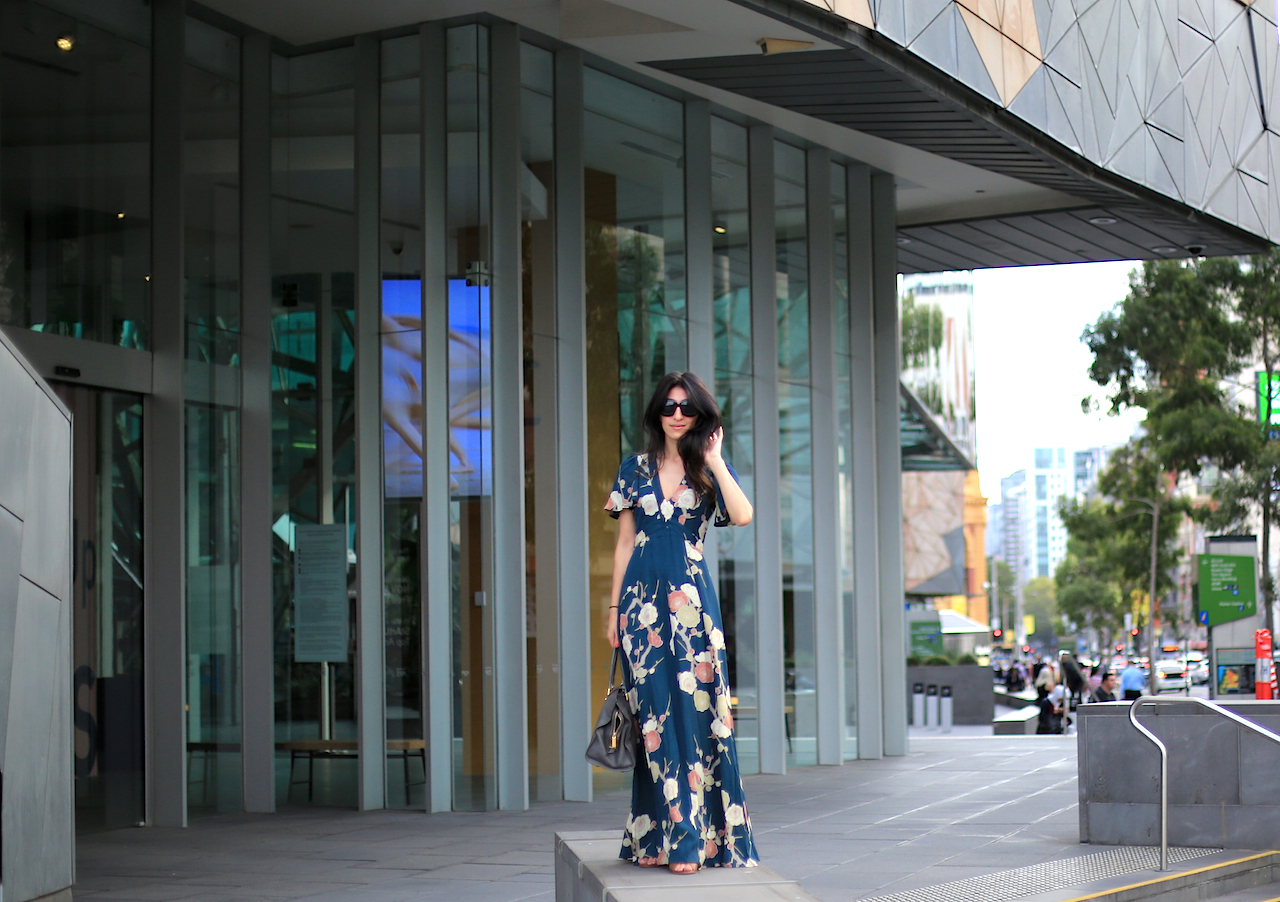 The kimono sleeves look flirty and feminine, but the bolder darker print keeps the girliness in check and balanced | ACMI - Melbourne, Australia