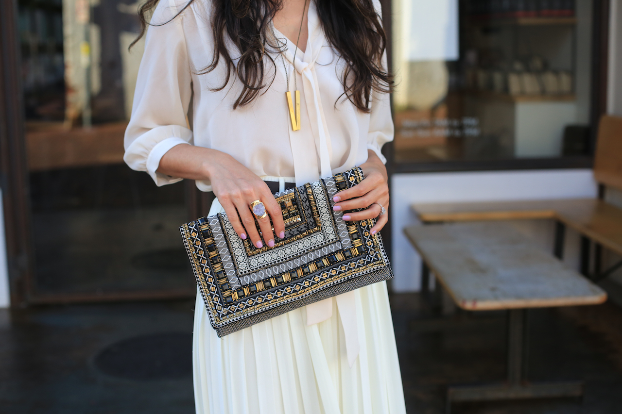 white outfit ring bag close-up