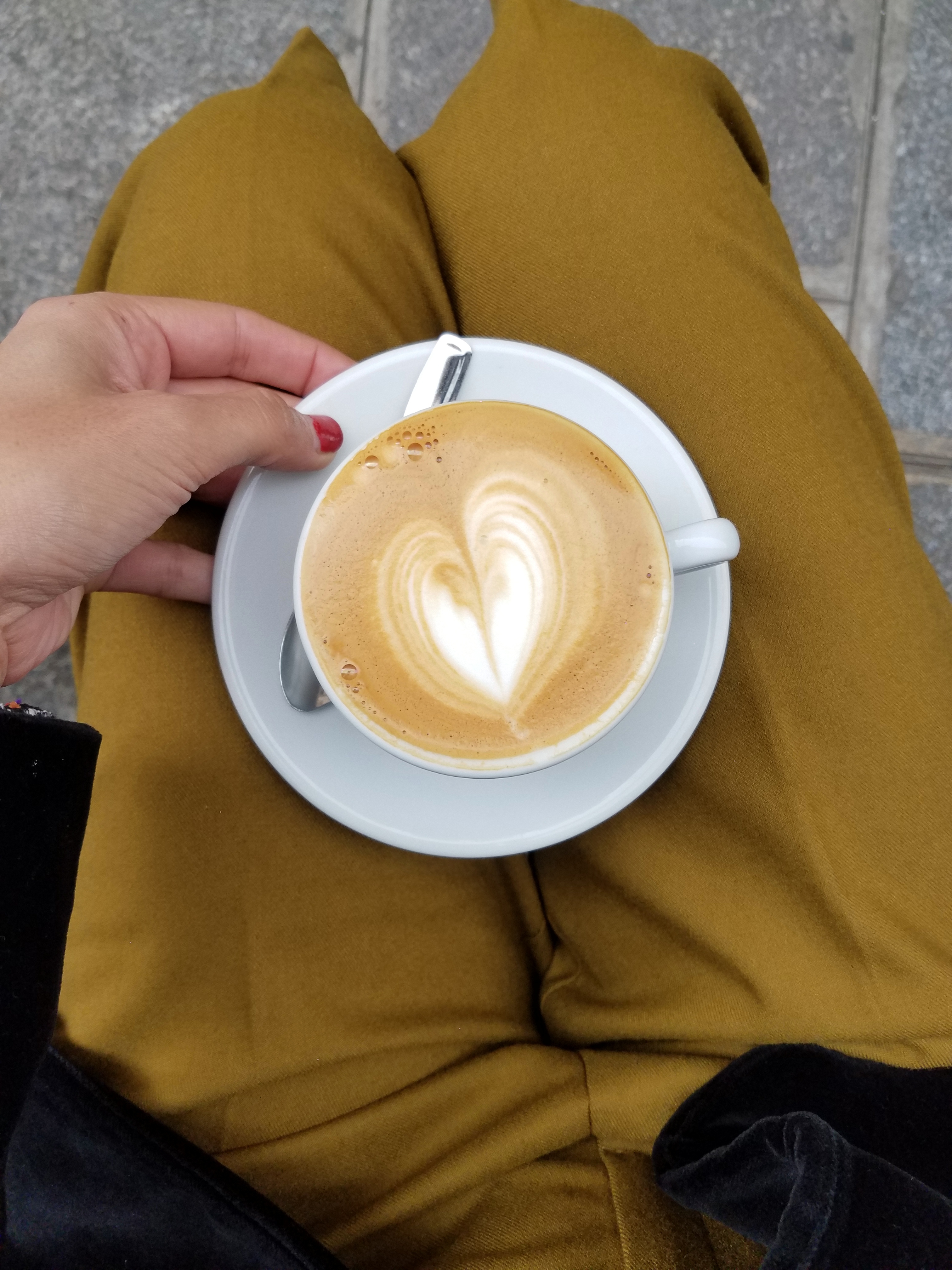 fragments-coffee-cup-in-lap